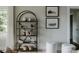 Stylish living room features a shelving unit with modern decor and seating at 434 Breezewood Dr, Belmont, NC 28012