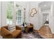 Cozy sitting area with natural light, stylish furnishings, and tranquil ambiance at 434 Breezewood Dr, Belmont, NC 28012