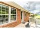 Exterior view highlighting the back of the house with a wooden deck and access to the expansive yard at 4470 W Bandys Cross Rd, Claremont, NC 28610