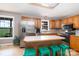Bright kitchen featuring stainless steel appliances, an island with seating, and a window view at 4470 W Bandys Cross Rd, Claremont, NC 28610