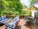 Relaxing back deck with ample seating, shade, and great privacy at 5900 Colwick Nw Ct, Concord, NC 28027