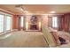 Finished basement with brick fireplace and projector lighting system at 5900 Colwick Nw Ct, Concord, NC 28027