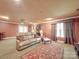 Finished basement space featuring projector screen, couch, and recessed lighting at 5900 Colwick Nw Ct, Concord, NC 28027
