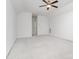 Spacious and bright bedroom features a ceiling fan and neutral carpet at 6033 Bountiful St # 201, Belmont, NC 28012
