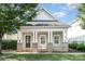Charming exterior view of home with inviting front porch and manicured lawn at 6033 Bountiful St # 201, Belmont, NC 28012