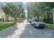 Quiet, tree-lined street showcasing well-maintained lawns and neatly parked cars, embodying suburban charm at 6033 Bountiful St # 201, Belmont, NC 28012
