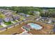 A relaxing pool in a new construction neighborhood with sidewalks and manicured lawns at 7604 Tanglewood Way, Denver, NC 28037