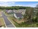 Aerial view of home displaying back yard with surrounding neighborhood homes at 7604 Tanglewood Way, Denver, NC 28037
