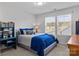 Bedroom with a bed, window, and a cozy atmosphere for comfort at 7604 Tanglewood Way, Denver, NC 28037