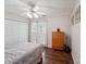 Comfortable bedroom with a ceiling fan, wood floor, and closet at 8105 Castlemaine Dr, Matthews, NC 28104
