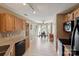 Bright breakfast nook adjacent to the kitchen with large windows and tile flooring at 8105 Castlemaine Dr, Matthews, NC 28104