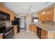 Traditional kitchen featuring tile floors, granite countertops and stainless steel appliances at 8105 Castlemaine Dr, Matthews, NC 28104