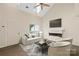Inviting living room featuring a modern fireplace, vaulted ceilings, and stylish decor for comfortable living at 8302 Holbrook Square Ct, Charlotte, NC 28216