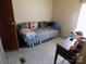 Bedroom featuring a cozy daybed, workspace, and a small closet at 868 Alexis High Shoals Rd, Dallas, NC 28034