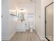A bathroom features a single sink vanity, toilet, and shower stall, offering a functional and efficient space at 8747 Coralbell Ln, Charlotte, NC 28213