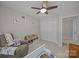 Comfortable bedroom with a bed, a cozy seat, and a storage closet to keep your stuff organized and tidy at 9001 Peyton Randolph Dr, Charlotte, NC 28277