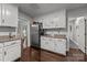 Bright kitchen featuring granite counters, stainless steel appliances, and hardwood floors at 9001 Peyton Randolph Dr, Charlotte, NC 28277