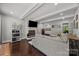 Spacious living room with wood floors, fireplace, and stylish decor at 9001 Peyton Randolph Dr, Charlotte, NC 28277
