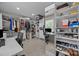 Well-organized walk-in closet with built-in shelving and a functional workspace at 9001 Peyton Randolph Dr, Charlotte, NC 28277