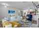 Bright living room with modern decor, white sofa, and an open layout perfect for entertaining at 9132 Colwick Hill Ln, Charlotte, NC 28215
