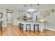 Open concept kitchen with granite island and bar stool seating at 916 Cadogan Ct, Fort Mill, SC 29708