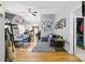 Open-concept living room with hardwood floors, ceiling fan and comfortable seating at 1006 Washburn Ct, Monroe, NC 28110