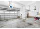Spacious two car garage with ample storage and natural light at 10901 Greenvale Dr, Harrisburg, NC 28075