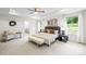 Main bedroom featuring neutral walls, carpet, a ceiling fan, and natural lighting at 10901 Greenvale Dr, Harrisburg, NC 28075