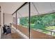A covered balcony overlooking the courtyard, featuring seating and outdoor living space at 1121 Myrtle Ave # 72, Charlotte, NC 28203