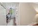 Bright dining room with hardwood floors and chandelier, viewed from hallway at 1121 Myrtle Ave # 72, Charlotte, NC 28203