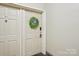 Inviting entrance featuring a front door adorned with a decorative wreath for a warm welcome at 1121 Myrtle Ave # 72, Charlotte, NC 28203