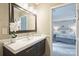 Stylish bathroom with modern vanity and a glimpse into the cozy bedroom at 11619 Rimrock Canyon Dr, Charlotte, NC 28226
