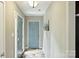 Hallway with tile flooring, leading to the rest of the home at 11619 Rimrock Canyon Dr, Charlotte, NC 28226