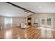 Inviting living room featuring vaulted ceilings, hardwood floors, and a fireplace at 11619 Rimrock Canyon Dr, Charlotte, NC 28226