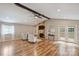 Inviting living room featuring vaulted ceilings, hardwood floors, and a fireplace at 11619 Rimrock Canyon Dr, Charlotte, NC 28226