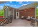 Spacious back deck with string lights, cozy seating, and views of the screened-in porch at 149 Harbor Landing Dr, Mooresville, NC 28117