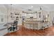 Bright, open kitchen featuring a large island with seating and stainless steel appliances at 149 Harbor Landing Dr, Mooresville, NC 28117