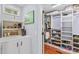 Organized walk-in closet with custom shelving and storage solutions for shoes and clothes at 149 Harbor Landing Dr, Mooresville, NC 28117