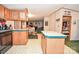 Charming kitchen with wood cabinets, black appliances, and a bright, open layout to living spaces at 1574 Burke Duncan Rd, Lancaster, SC 29720