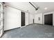 Spacious two-car garage features a durable epoxy floor and convenient access door at 158 Mattoon St, Charlotte, NC 28216
