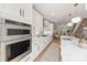 Bright and modern kitchen with stainless steel appliances and large center island at 158 Mattoon St, Charlotte, NC 28216