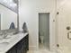 Bathroom boasting a double sink vanity, modern fixtures, and a shower stall at 1605 Allen St, Charlotte, NC 28205