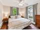 Bright bedroom with natural light, hardwood floors, and neutral decor at 1605 Allen St, Charlotte, NC 28205