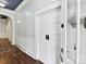 Bright hallway features wood floors, beadboard paneling, and a blue ceiling at 1605 Allen St, Charlotte, NC 28205