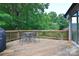 Wooden deck with views of the lush green backyard and surrounding trees at 16433 Grapperhall Dr, Huntersville, NC 28078