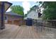 Outdoor deck with seating area and grill, perfect for entertaining at 16433 Grapperhall Dr, Huntersville, NC 28078