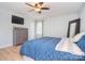 Bedroom featuring hardwood floors, neutral walls, ceiling fan, and natural light at 16433 Grapperhall Dr, Huntersville, NC 28078