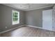 Bedroom featuring a ceiling fan, light gray walls and trim, and a window providing natural light at 251 Hall Spencer Rd, Catawba, SC 29704