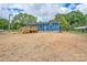 Newly constructed home featuring blue siding, a wooden deck, and a spacious yard ready for landscaping at 251 Hall Spencer Rd, Catawba, SC 29704