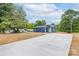 Lovely blue house with a long driveway and well-maintained landscaping at 251 Hall Spencer Rd, Catawba, SC 29704